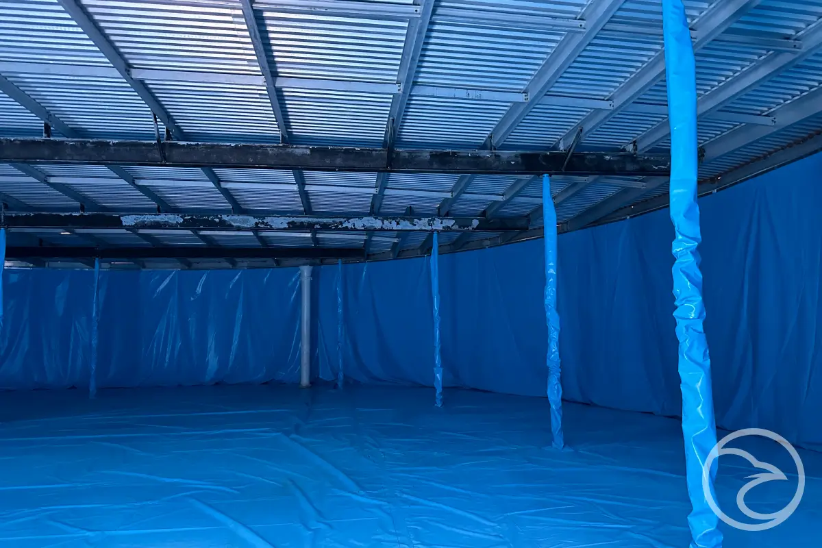 Fire tank lining installation inside a steel tank