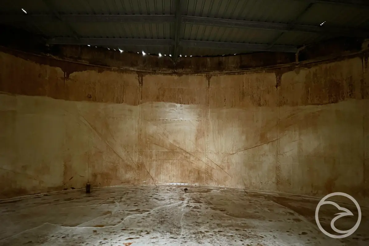 Close-up view of tank material aging caused by prolonged water contact